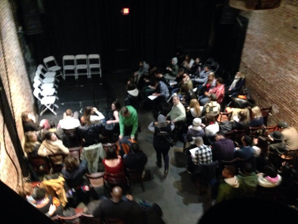 Blurry view from the balcony as the audience at the Nuyorican settles in