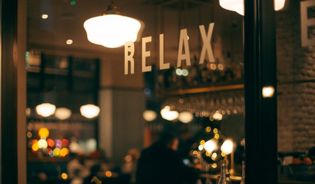 coffee shop sign that says "relax"