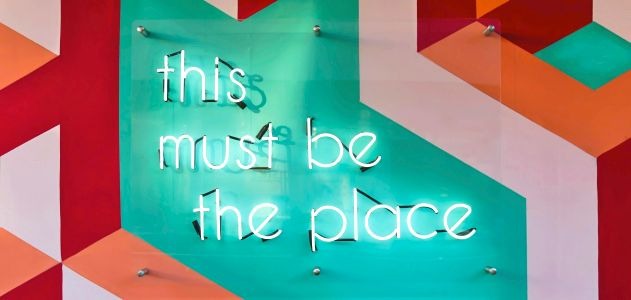 neon sign that reads "this must be the place"