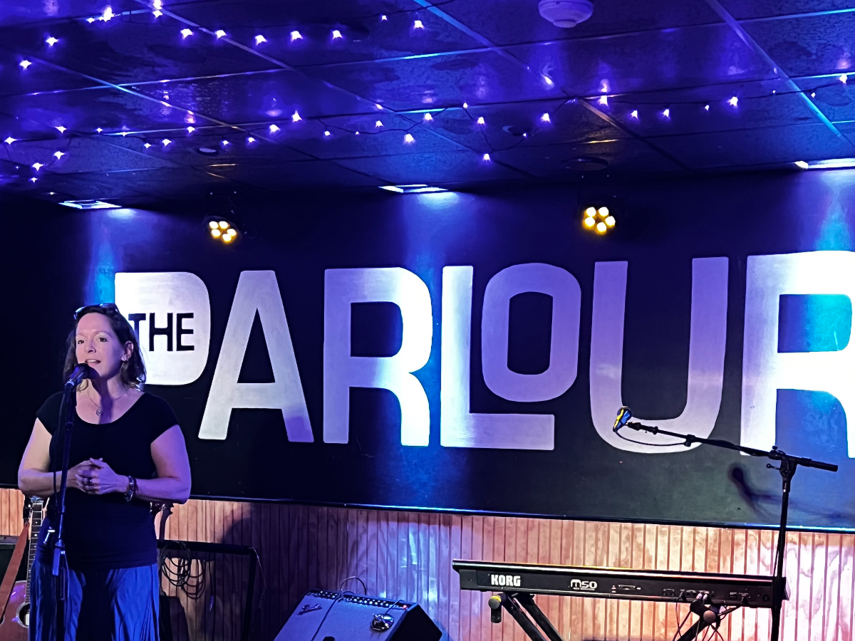 Anna Weaver on stage at The Parlour open mic